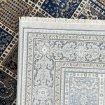 A beautifully detailed Turkish machine-made rug inspired by the traditional Persian Bakhtiari design. Featuring a distinctive panel layout with individual floral and garden-style motifs, this rug offers a structured yet decorative look. The rich navy tones combined with soft ivory and beige create a balanced contrast that stands out while remaining elegant. Durable and easy to maintain, it’s perfect for high-traffic areas and adds a timeless, classic touch to both modern and traditional interiors. Color: Grey, Beige Size: 230 x 160cm Make: Machine-made Made In: Turkey Material: Polyester Condition: New Note to Customers: Carefully measure your space before purchasing to ensure the rug fits your desired area. Colors may slightly vary due to lighting and monitor settings.